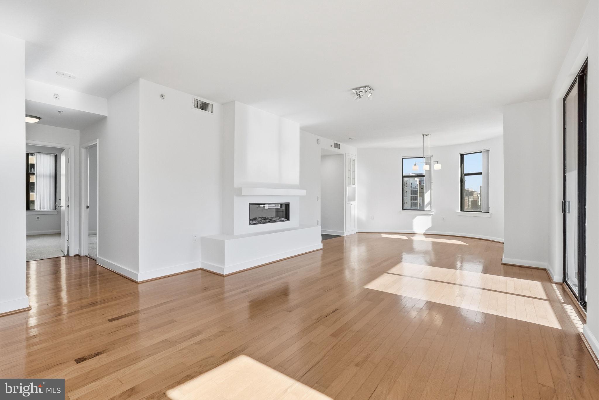 400 Massachusetts Avenue Northwest, Unit 719 Washington, DC 20001 - Photo 5 of 38 a view interior of the house with wooden floor