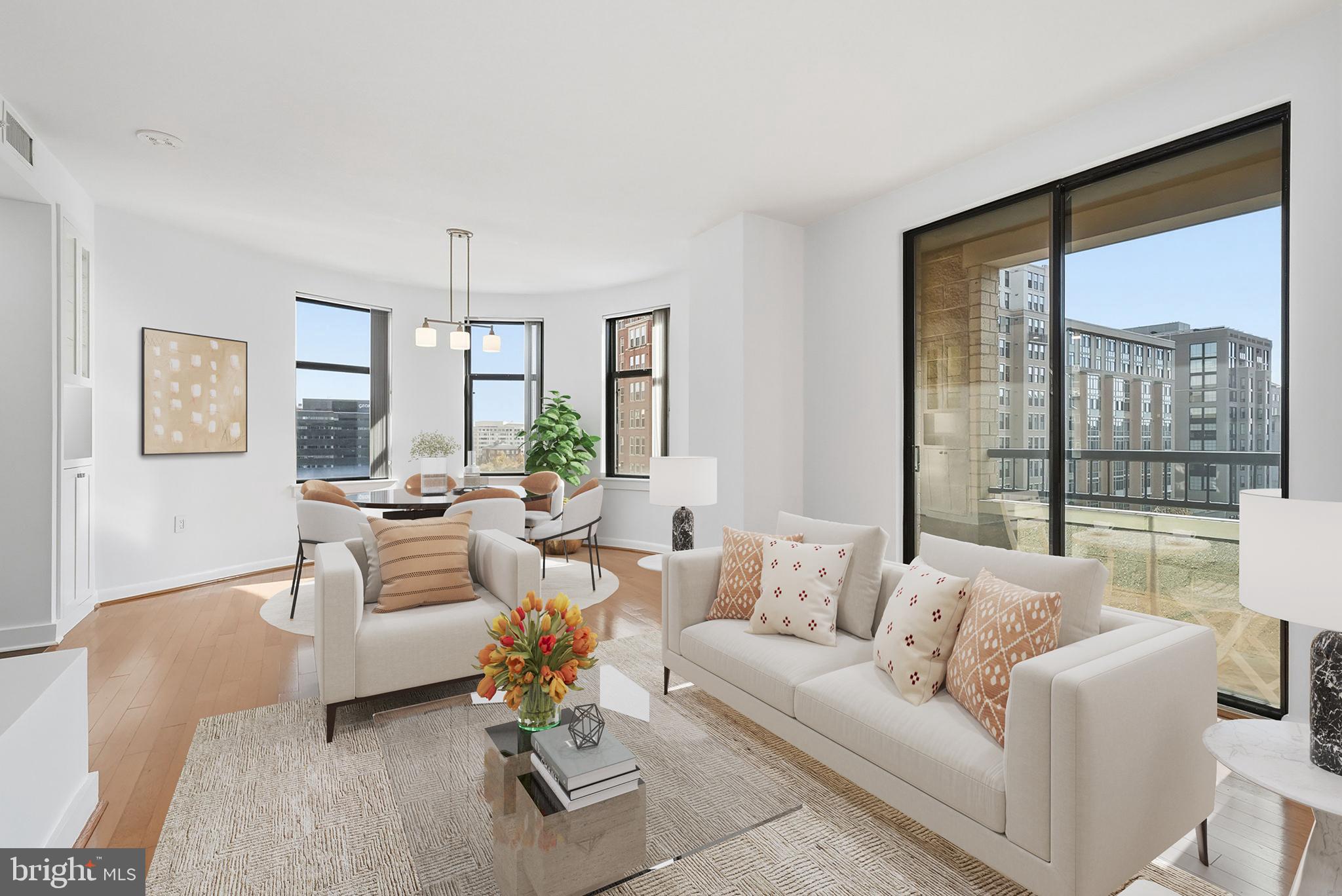 400 Massachusetts Avenue Northwest, Unit 719 Washington, DC 20001 - Photo 8 of 38 a living room with furniture and a large window