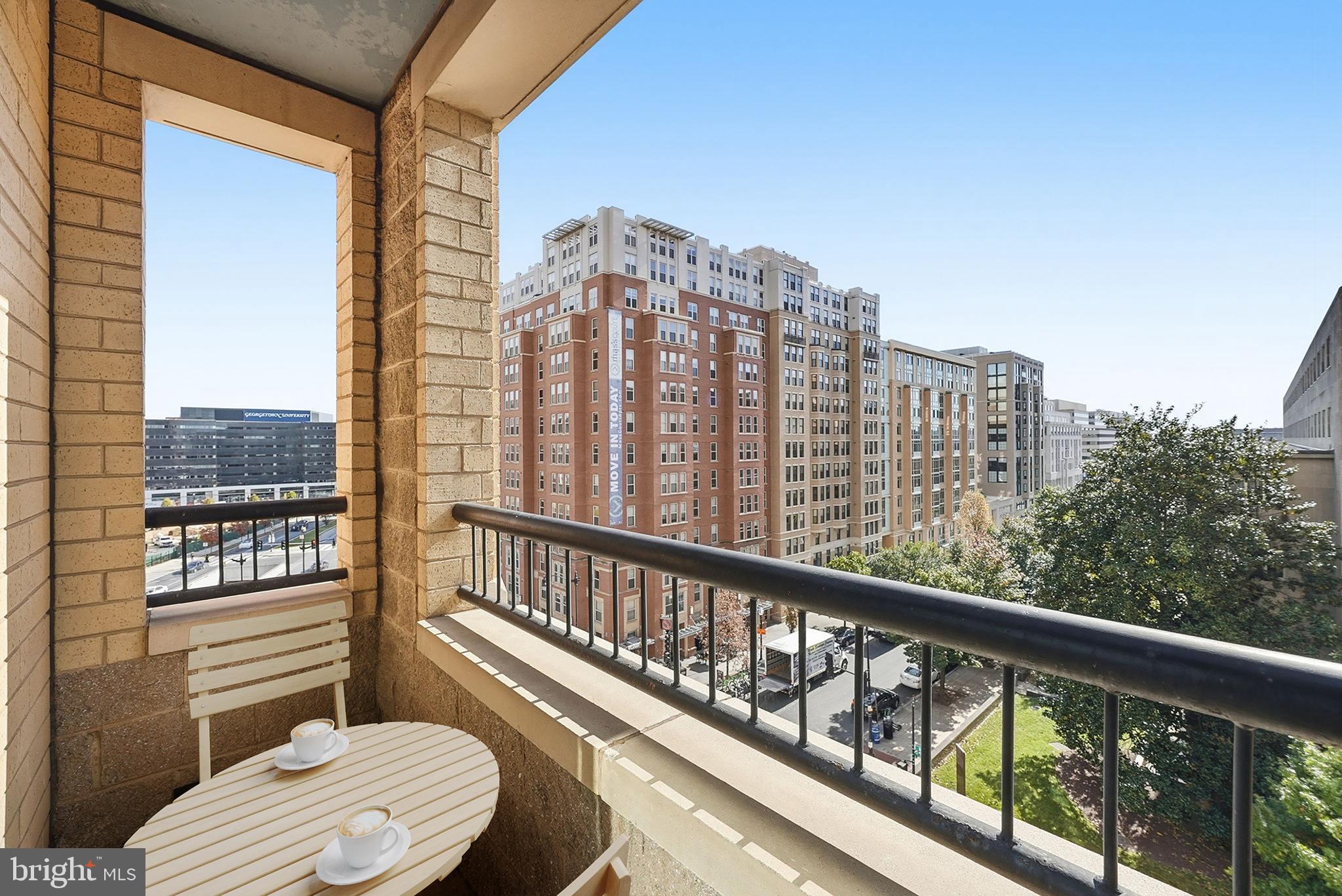 400 Massachusetts Avenue Northwest, Unit 719 Washington, DC 20001 - Photo 10 of 38 a view of a city from a balcony
