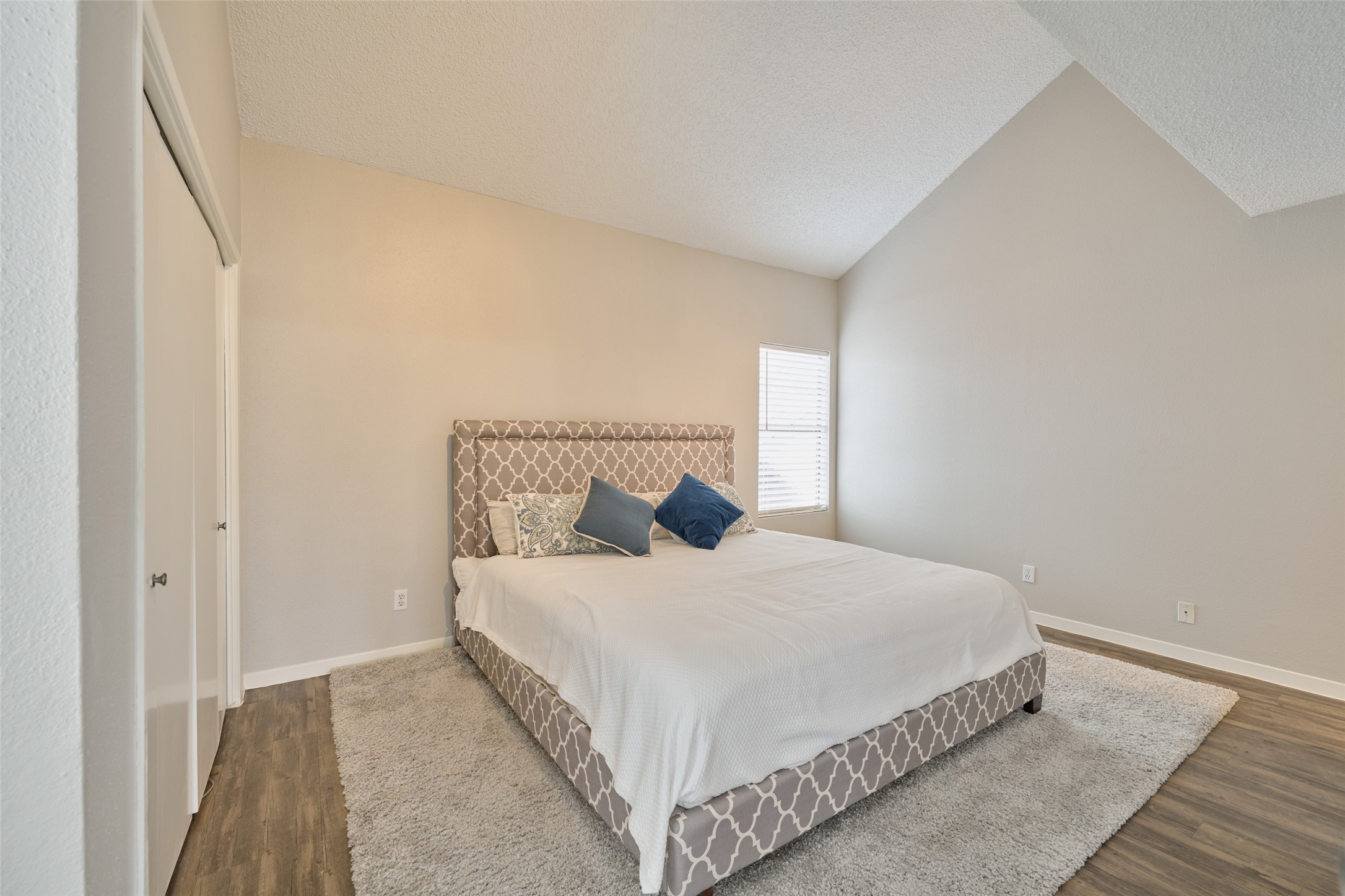 12900 Walden Road, Unit 602F Montgomery, TX 77356 - Photo 17 of 26 Spacious primary bedroom. This bed was replaced with a brand new bed and new mattresses.