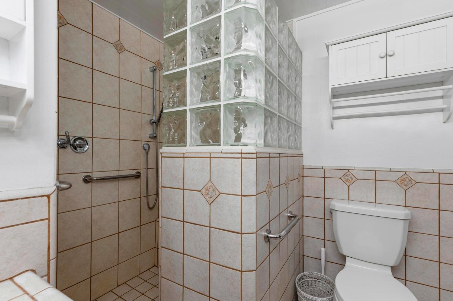 4361 Dresser Road Yuba City, CA 95993 - Photo 17 of 78 a bathroom with a toilet and shower