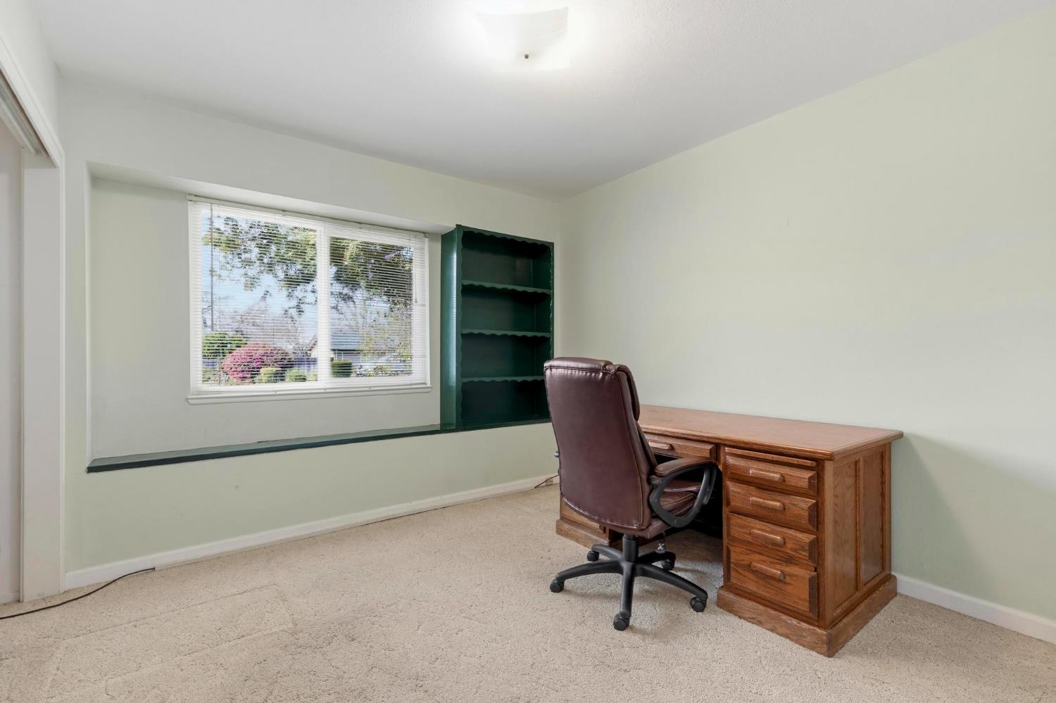 4361 Dresser Road Yuba City, CA 95993 - Photo 18 of 78 a view of a workspace with furniture and a window