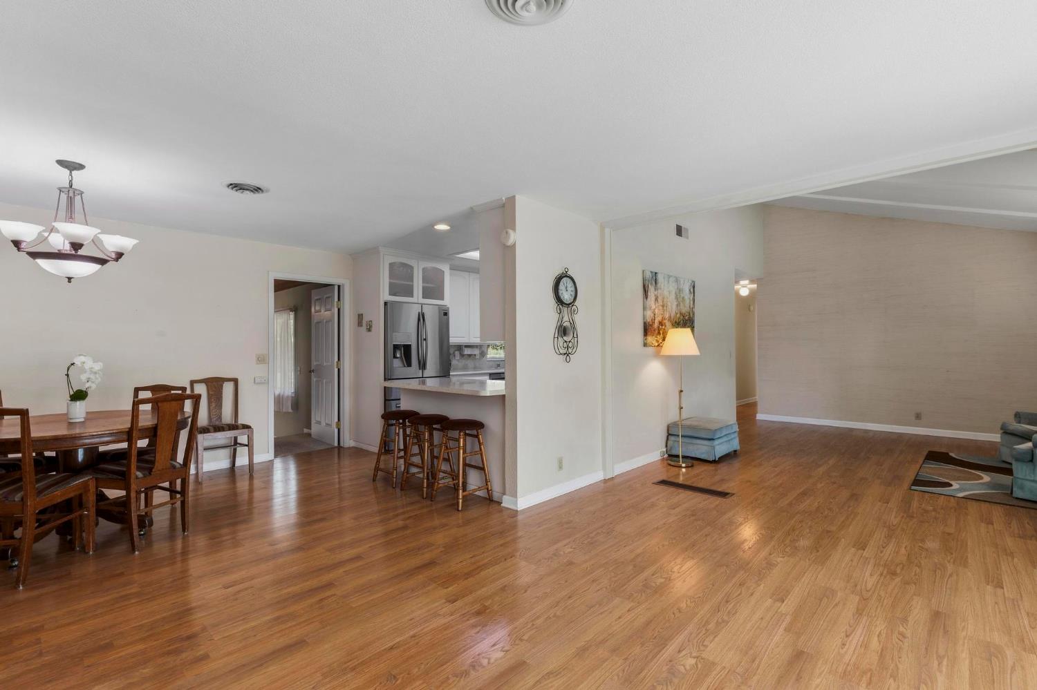 4361 Dresser Road Yuba City, CA 95993 - Photo 28 of 78 a view of kitchen and dining room with wooden floor