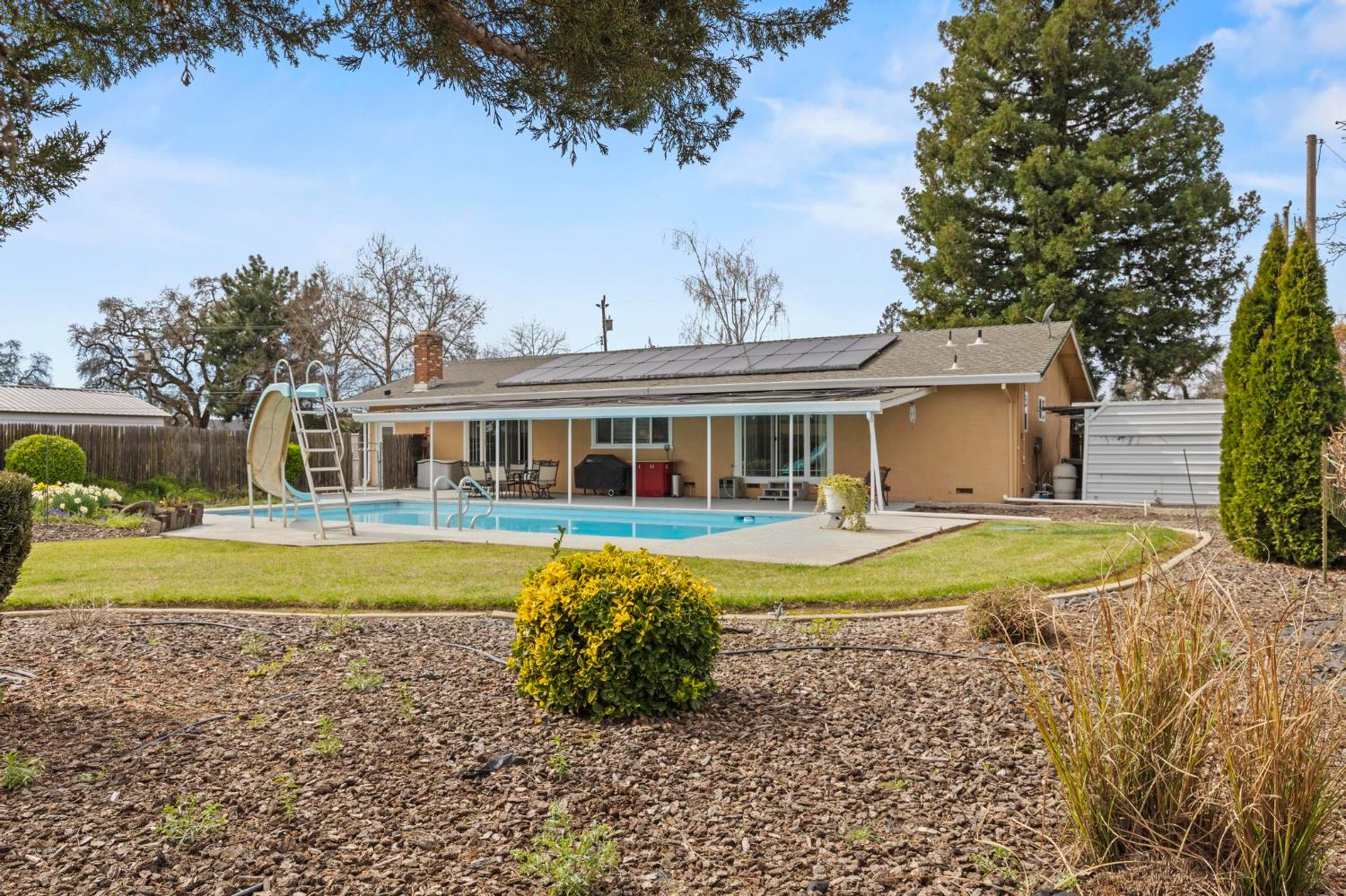4361 Dresser Road Yuba City, CA 95993 - Photo 34 of 78 a front view of a house with a yard