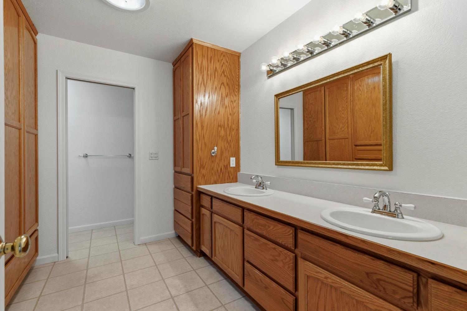 4361 Dresser Road Yuba City, CA 95993 - Photo 52 of 78 a bathroom with a sink double vanity and a mirror