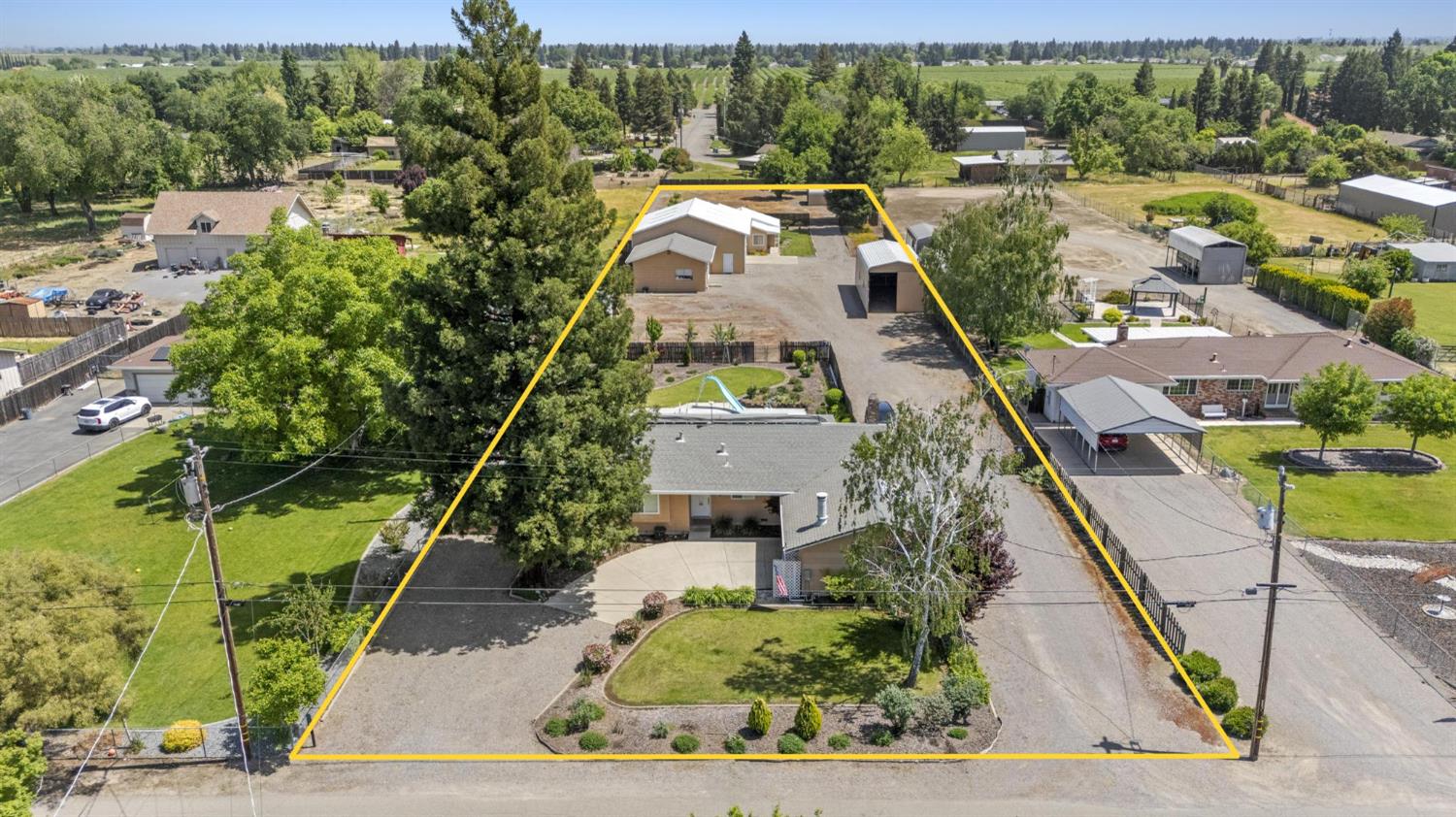 4361 Dresser Road Yuba City, CA 95993 - Photo 69 of 78 an aerial view of residential houses with outdoor space and street view