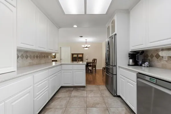 a bathroom with a toilet and shower