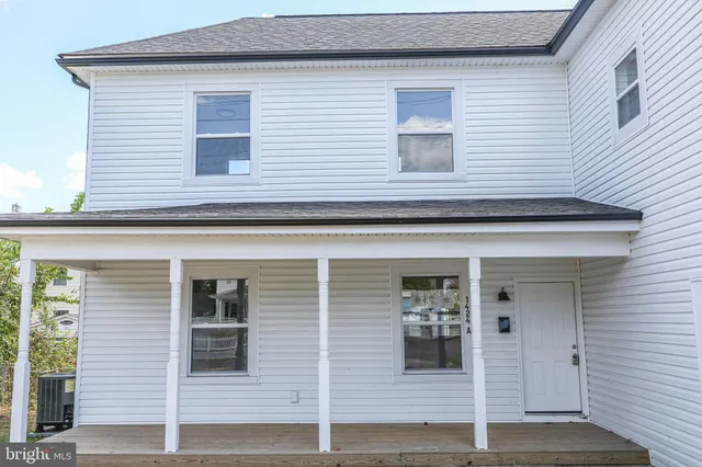 a view of a house with white door