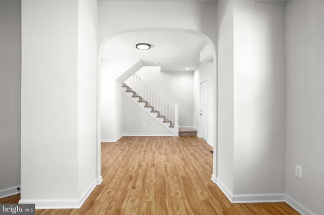 a view of entryway with wooden floor