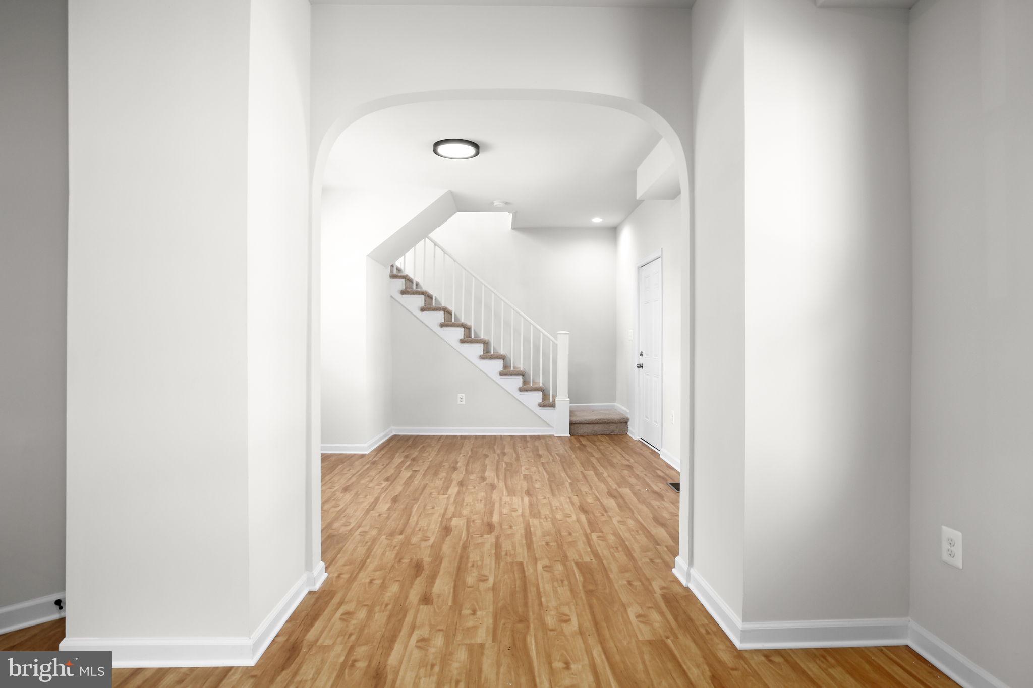 1424 William Street, Unit A Fredericksburg, VA 22401 - Photo 6 of 25 a view of entryway with wooden floor