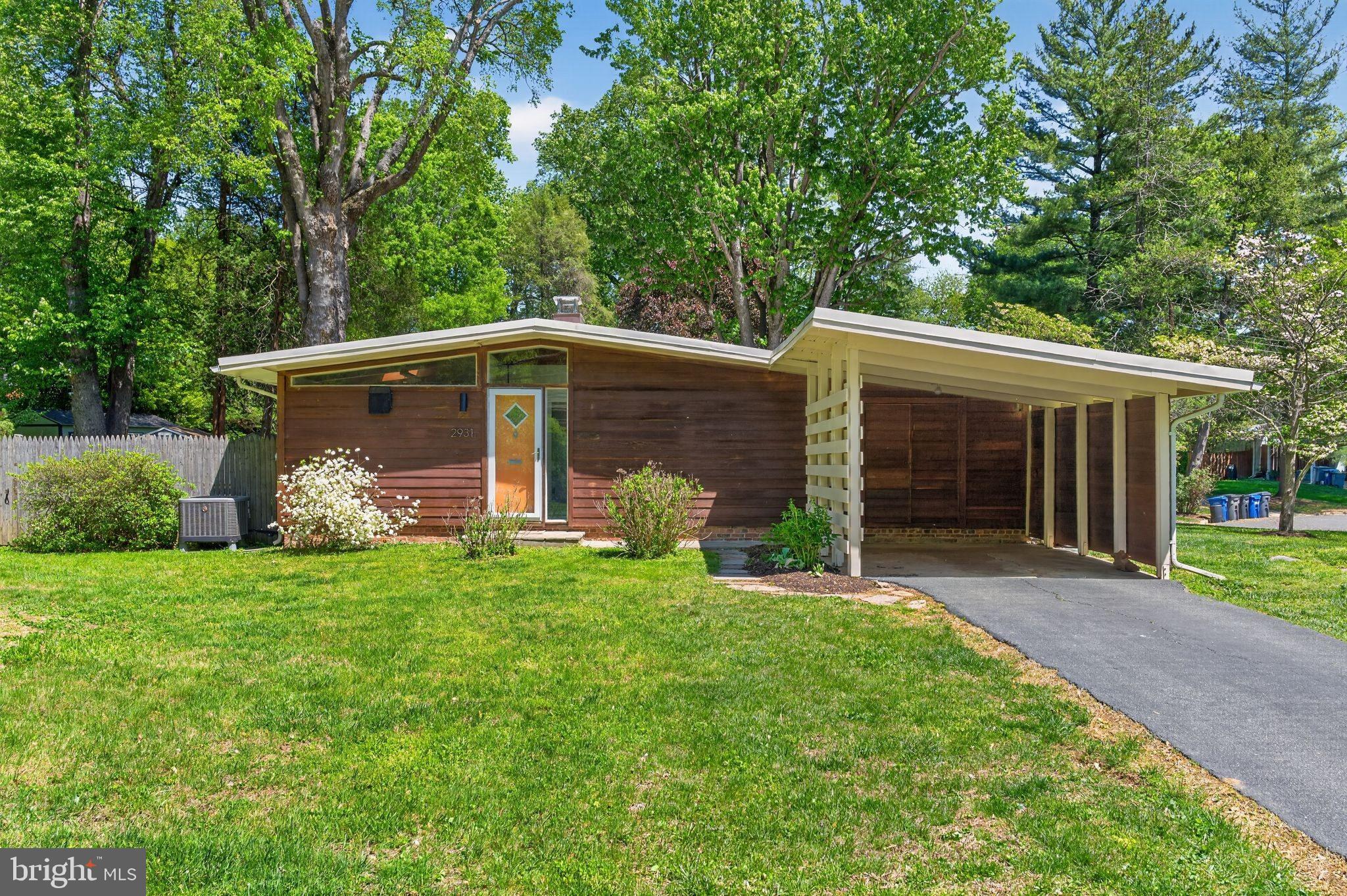 2931 Pine Spring Road Falls Church, VA 22042 - Photo 1 of 25 a front view of a house with garden