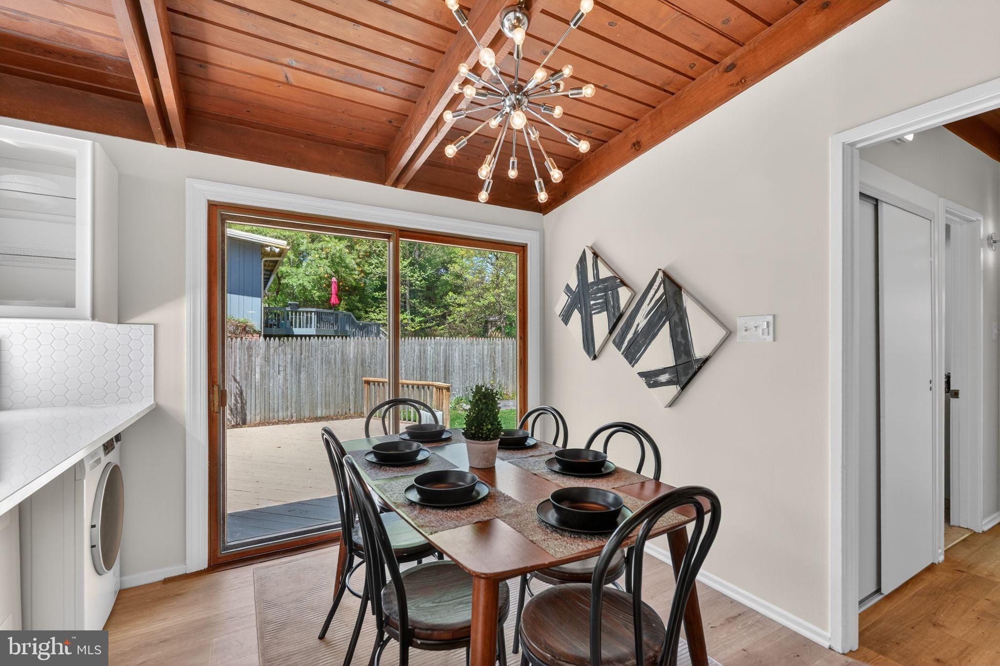 2931 Pine Spring Road Falls Church, VA 22042 - Photo 12 of 25 a view of a dining room with furniture window and outside view