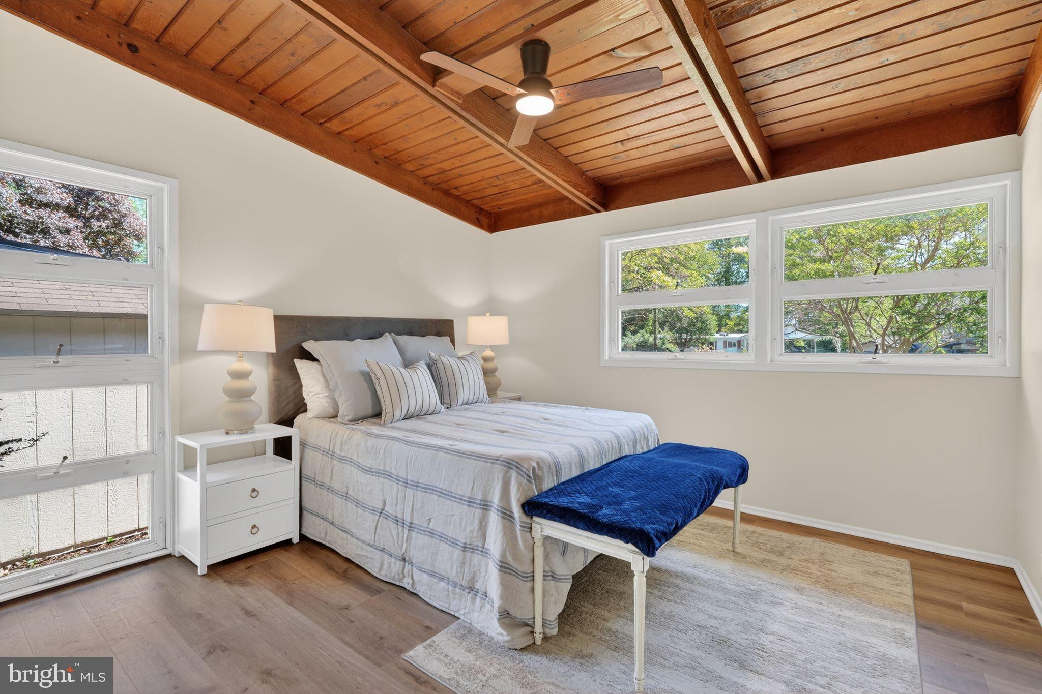 2931 Pine Spring Road Falls Church, VA 22042 - Photo 15 of 25 a bed room with a bed and a chair