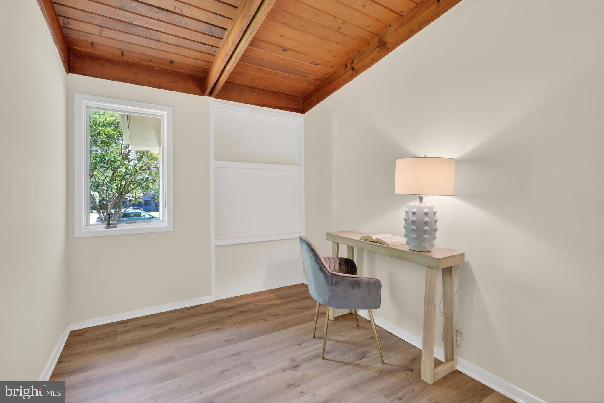 2931 Pine Spring Road Falls Church, VA 22042 - Photo 18 of 25 a view of an empty room with wooden floor and a window