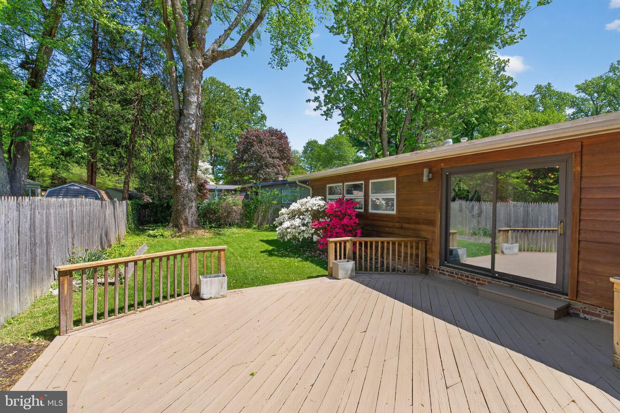 2931 Pine Spring Road Falls Church, VA 22042 - Photo 19 of 25 a view of a deck with furniture and next to a yard