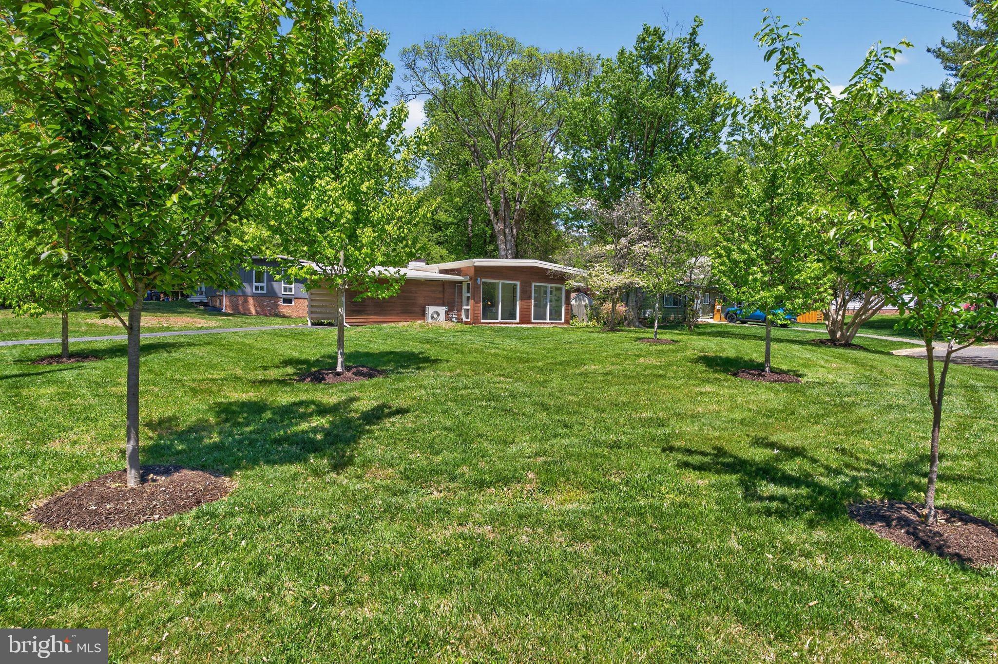 2931 Pine Spring Road Falls Church, VA 22042 - Photo 22 of 25 a view of an house with backyard space and balcony