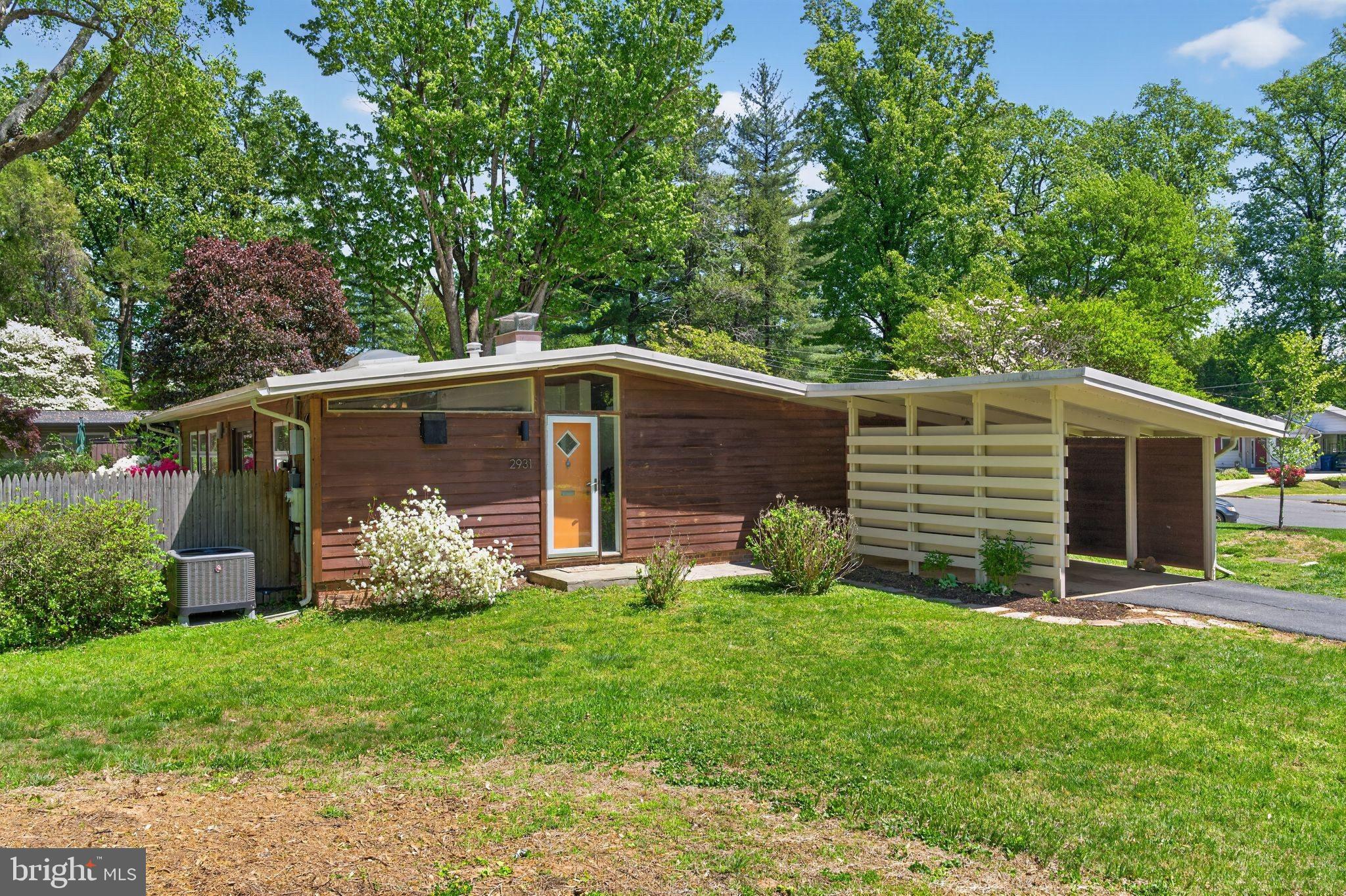 2931 Pine Spring Road Falls Church, VA 22042 - Photo 24 of 25 a view of a backyard with plants and large trees