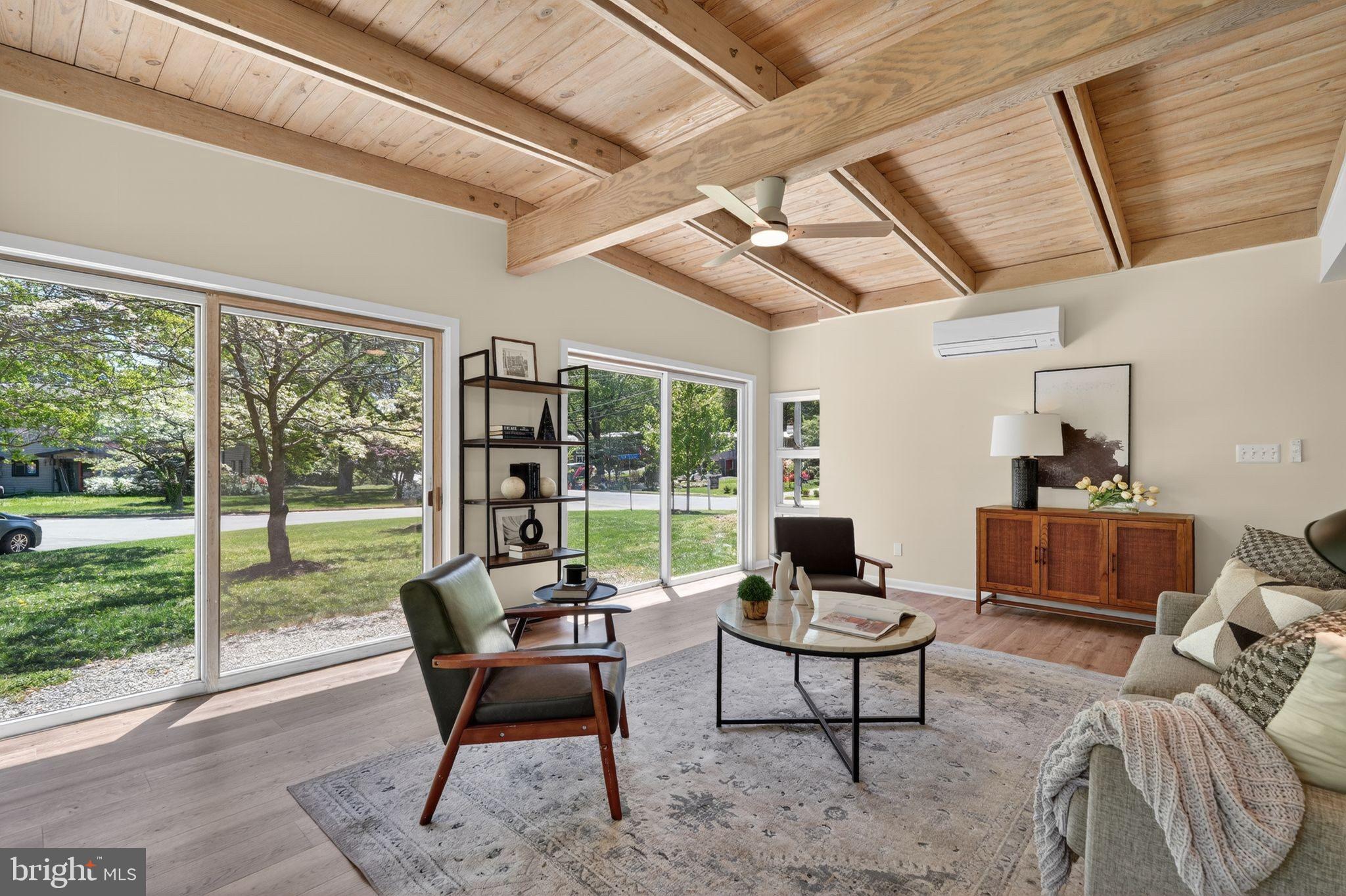 2931 Pine Spring Road Falls Church, VA 22042 - Photo 6 of 25 a living room with furniture and a floor to ceiling window