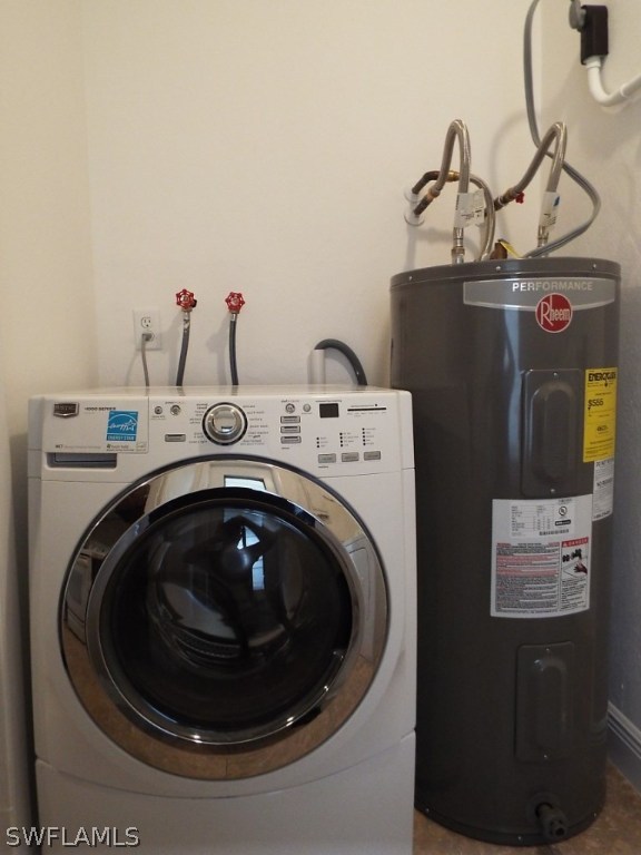 29 Andros Street Lehigh Acres, FL 33936 - Photo 11 of 16 a utility room with dryer and washer