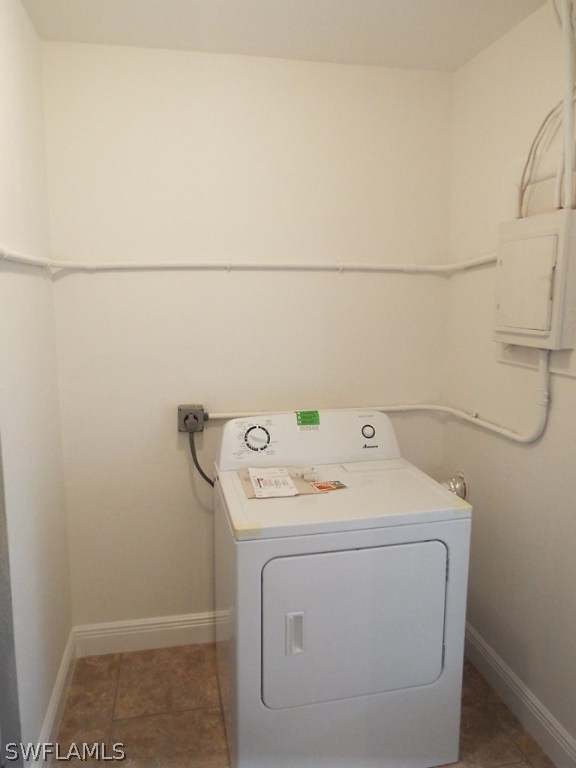 29 Andros Street Lehigh Acres, FL 33936 - Photo 12 of 16 a utility room with dryer and washer