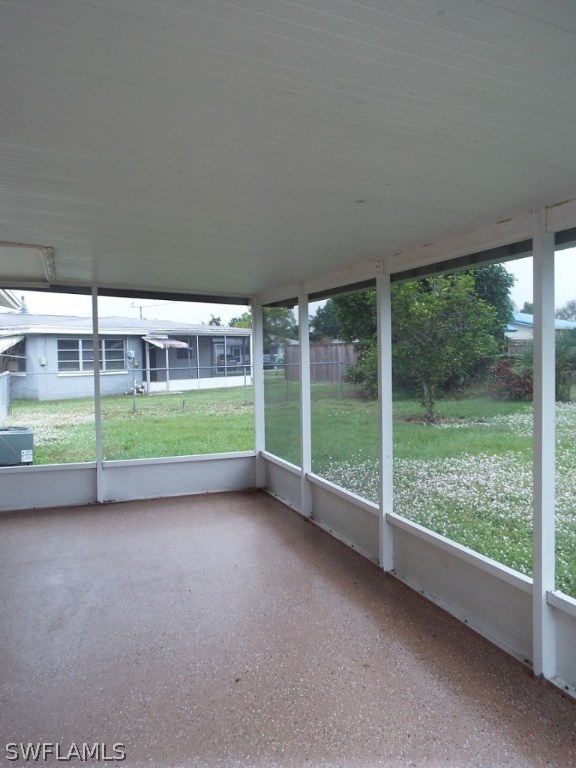 29 Andros Street Lehigh Acres, FL 33936 - Photo 13 of 16 a view of a porch with a yard