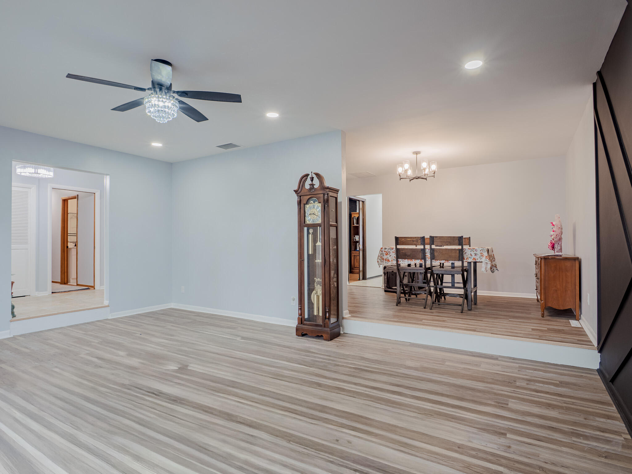 5301 Delaware Street Merrillville, IN 46410 - Photo 11 of 34 a view of a livingroom with furniture and a ceiling fan