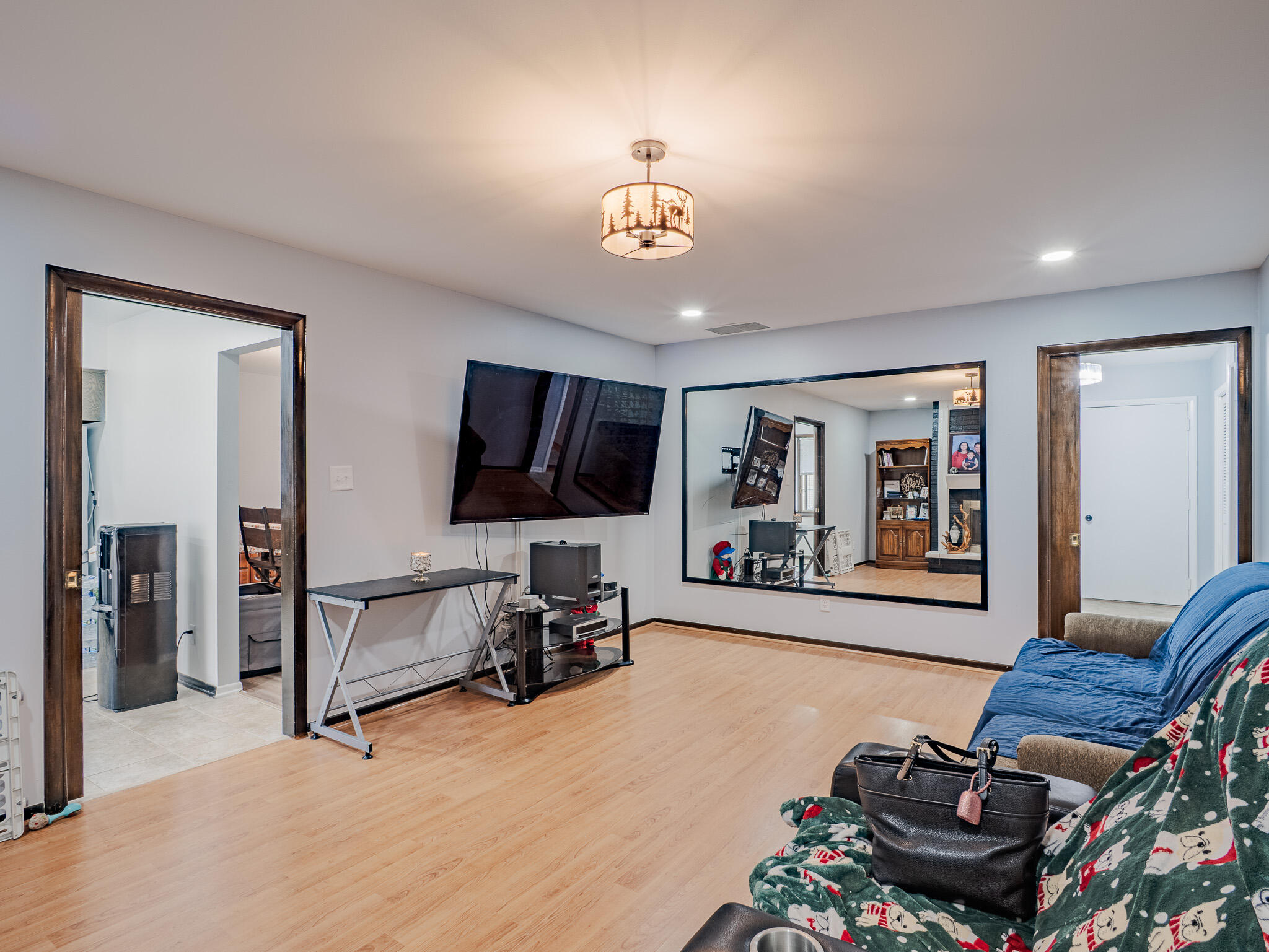 5301 Delaware Street Merrillville, IN 46410 - Photo 14 of 34 a living room with furniture and a flat screen tv
