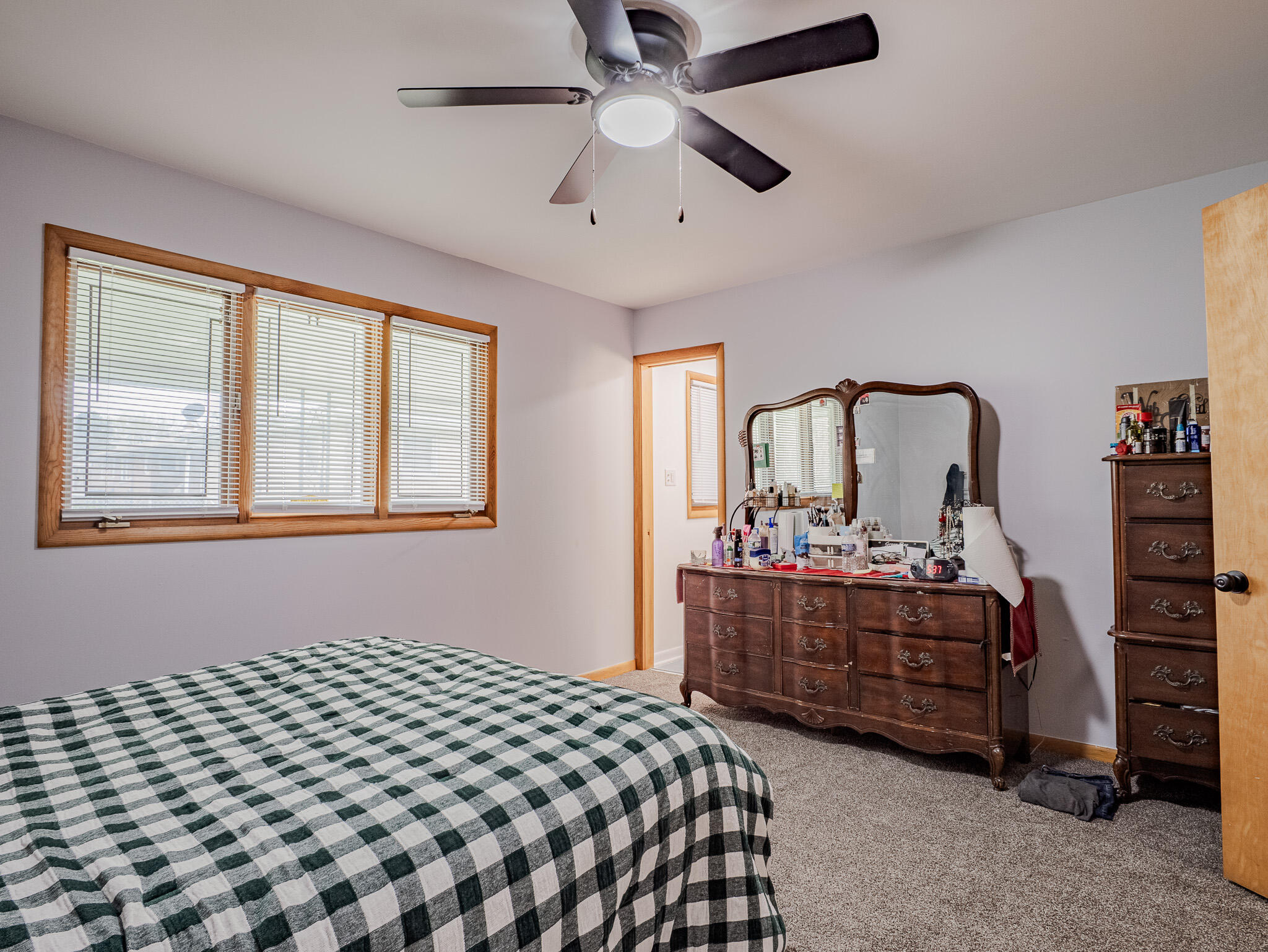 5301 Delaware Street Merrillville, IN 46410 - Photo 21 of 34 a bedroom with a bed and window