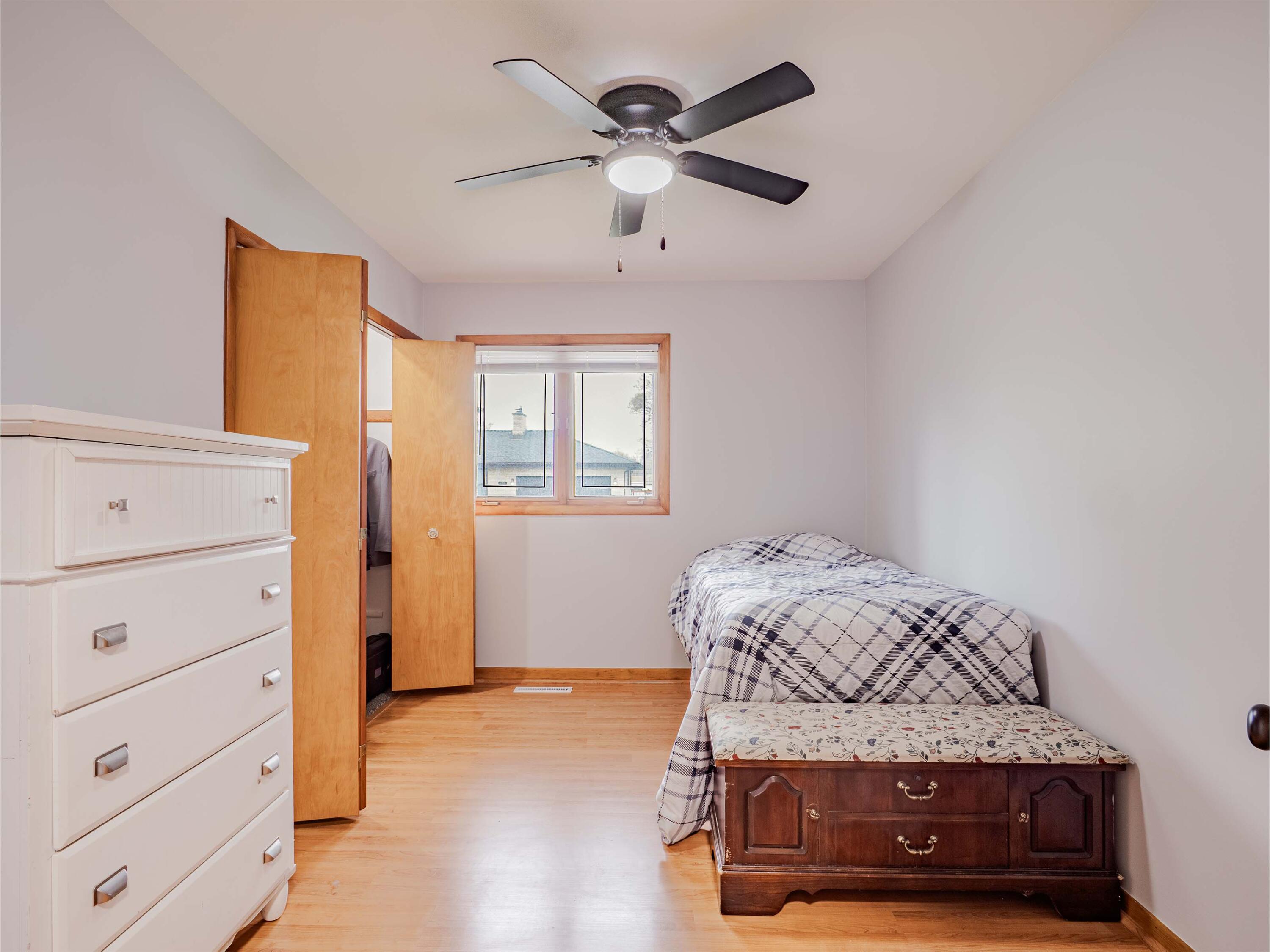 5301 Delaware Street Merrillville, IN 46410 - Photo 29 of 34 a bedroom with a bed and a closet