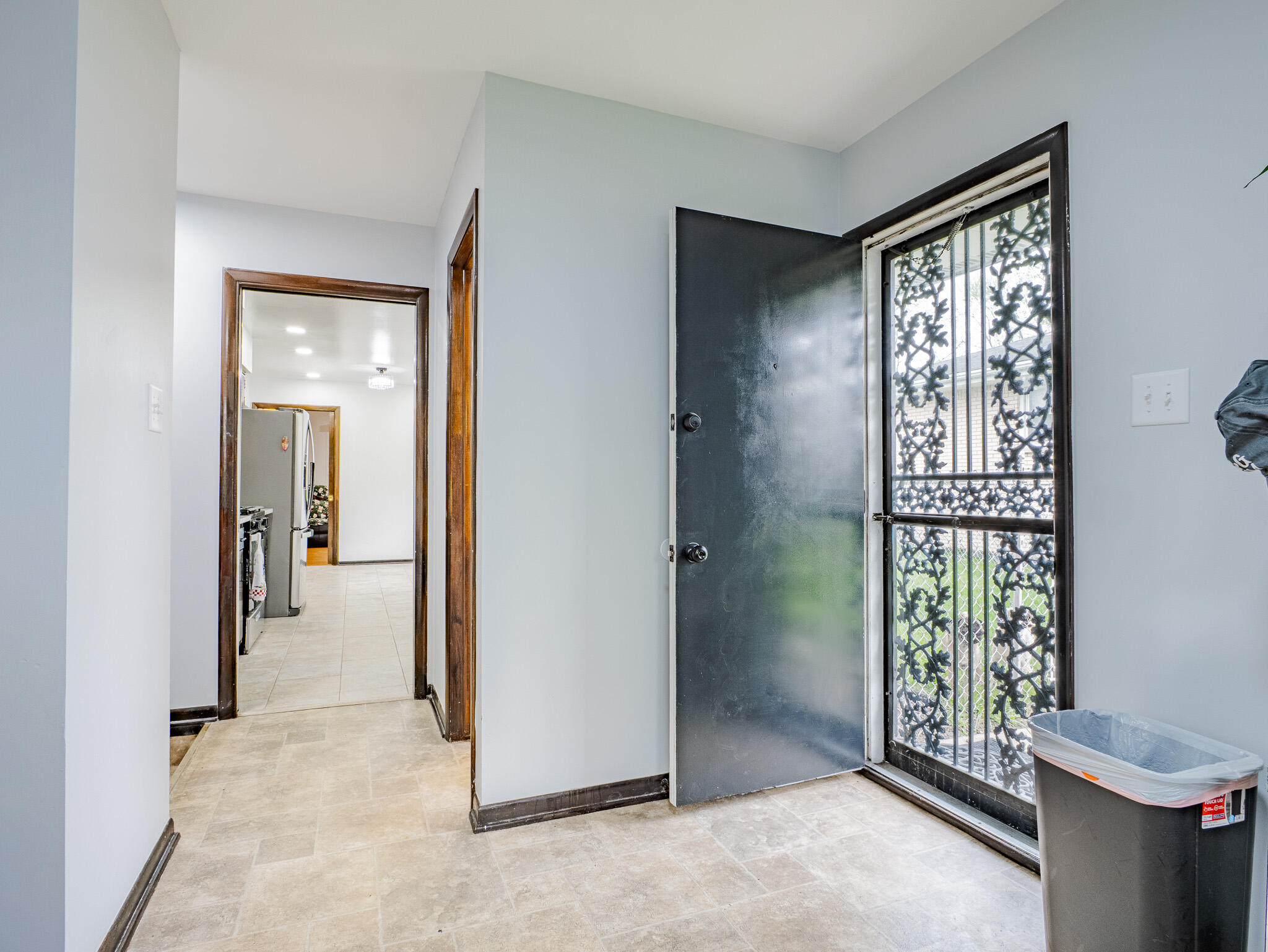 5301 Delaware Street Merrillville, IN 46410 - Photo 32 of 34 a view of an entryway with wooden floor