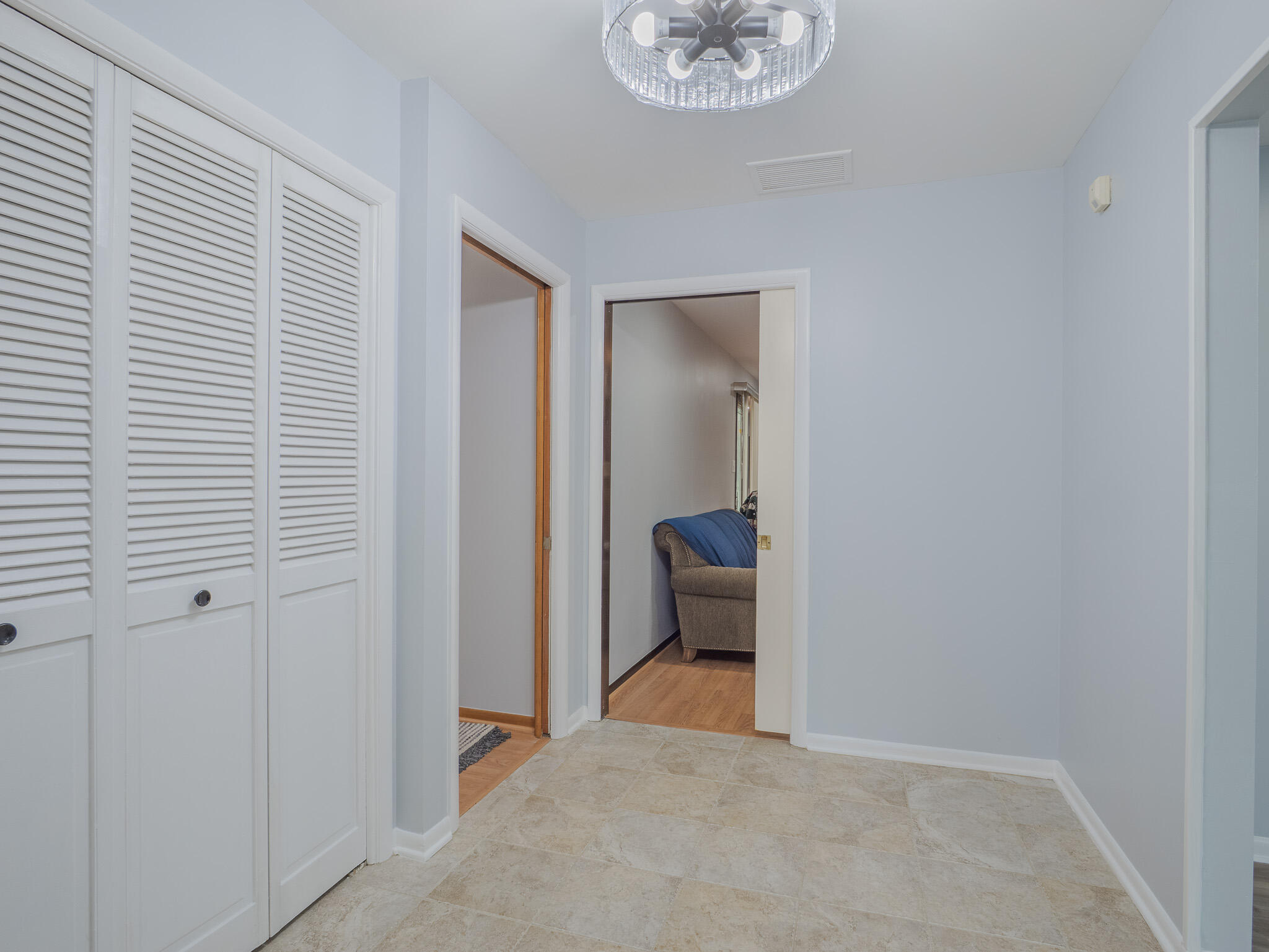 5301 Delaware Street Merrillville, IN 46410 - Photo 9 of 34 a view of a room that has a bench in it