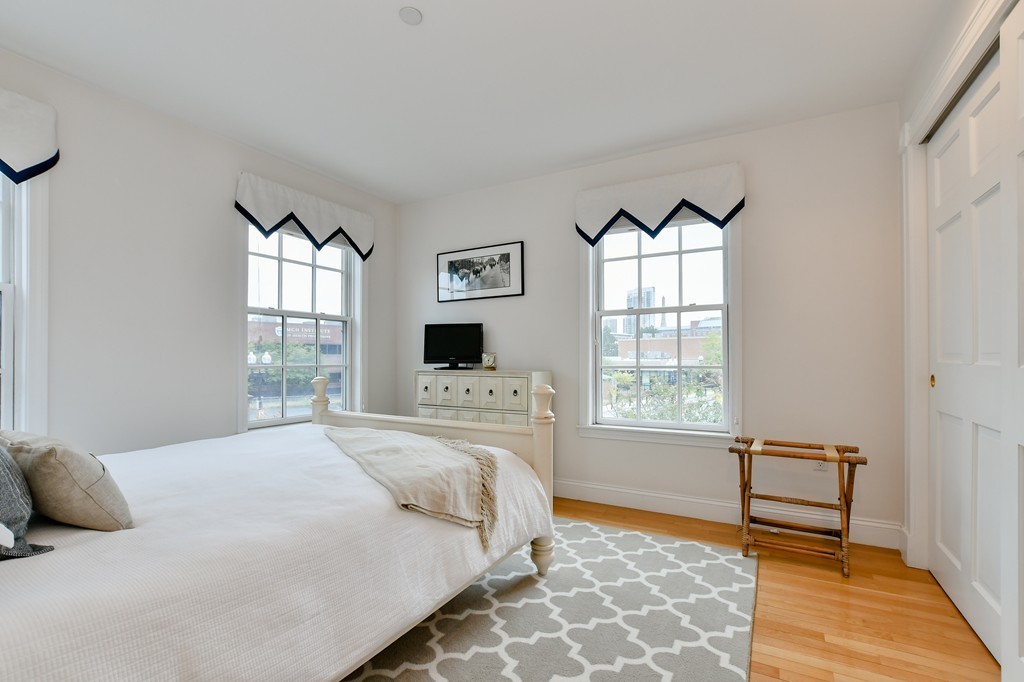 90 Constitution Road, Unit 90 Boston, MA 02129 - Photo 25 of 29 a bedroom with a bed and a window