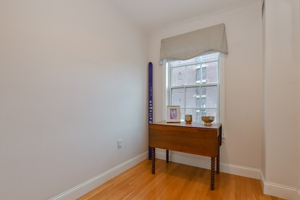 90 Constitution Road, Unit 90 Boston, MA 02129 - Photo 26 of 29 a view of a room with a table and chairs