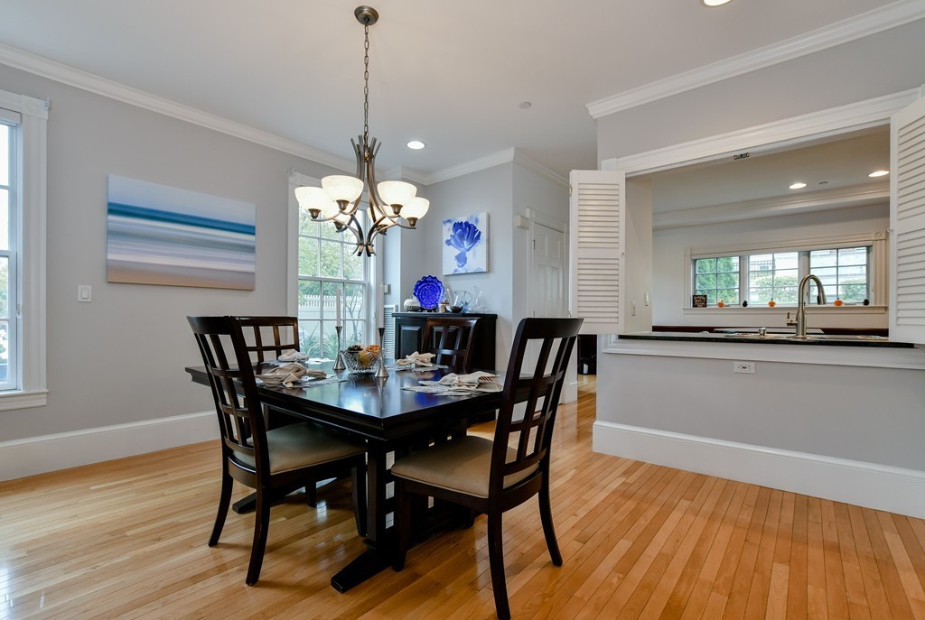90 Constitution Road, Unit 90 Boston, MA 02129 - Photo 10 of 29 a view of a dining room with furniture window and wooden floor