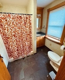 20 Slab Bridge Road Freetown, MA 02702 - Photo 28 of 42 a bathroom with a sink toilet and shower