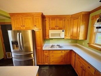 20 Slab Bridge Road Freetown, MA 02702 - Photo 38 of 42 a kitchen with stainless steel appliances a refrigerator and a sink