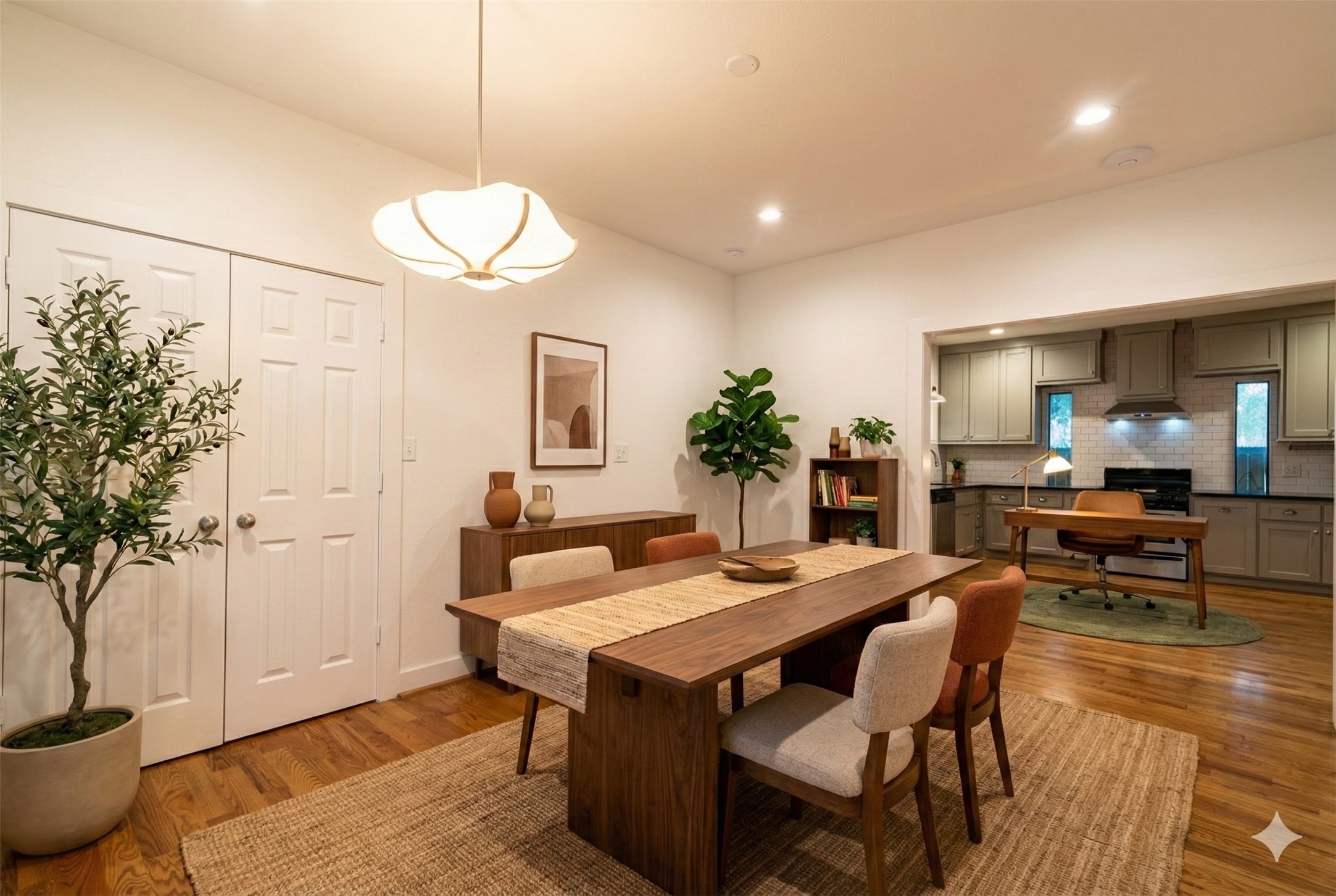 4734 Bell Street Houston, TX 77023 - Photo 2 of 42 a view of a dining room with furniture and wooden floor