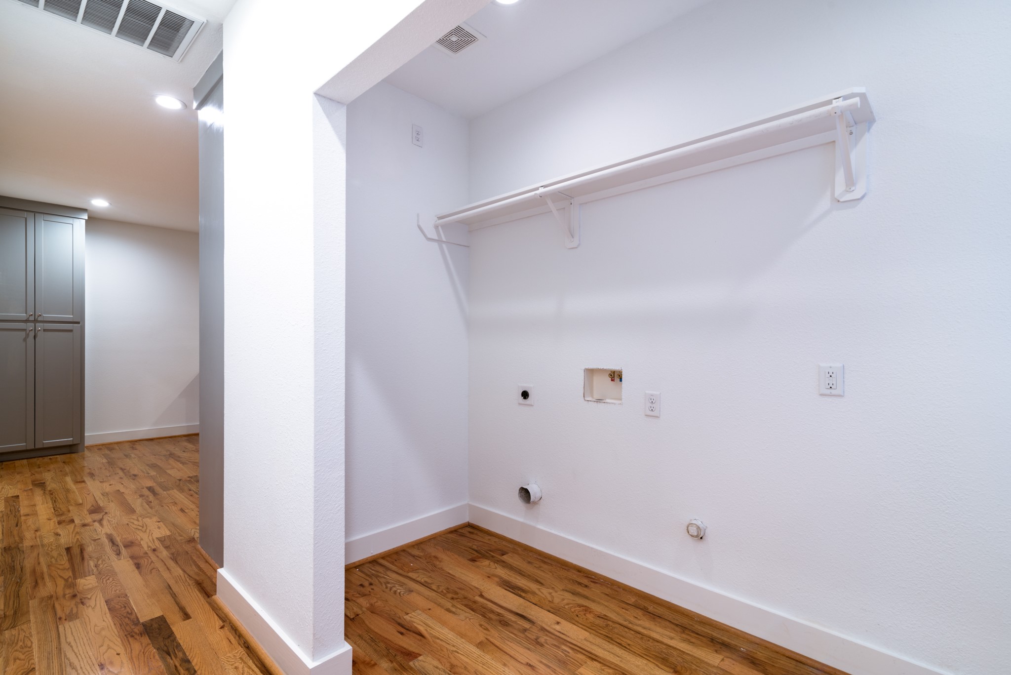 4734 Bell Street Houston, TX 77023 - Photo 23 of 42 a view of room with wooden floor