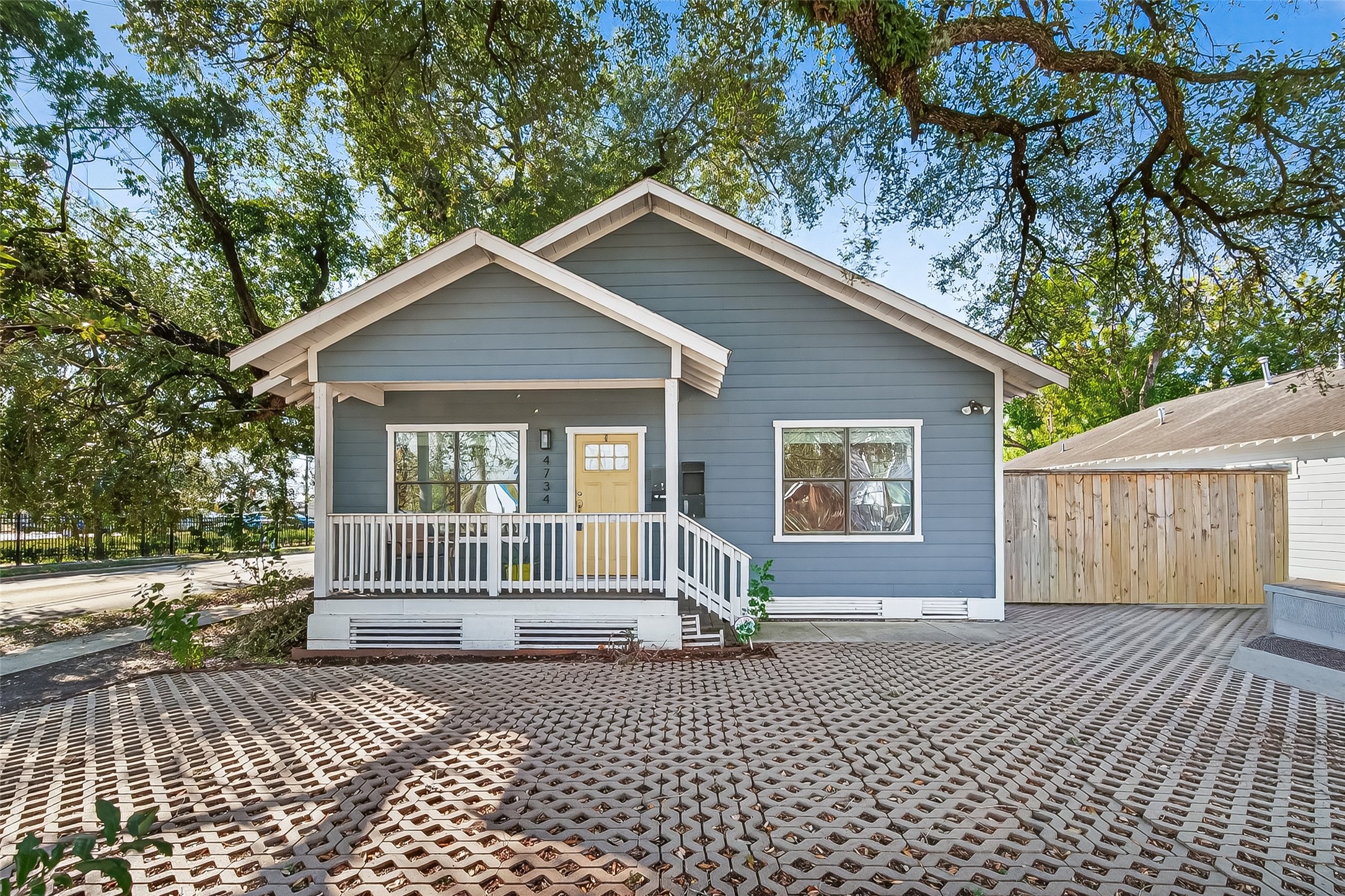 4734 Bell Street Houston, TX 77023 - Photo 34 of 42 a front view of a house with yard