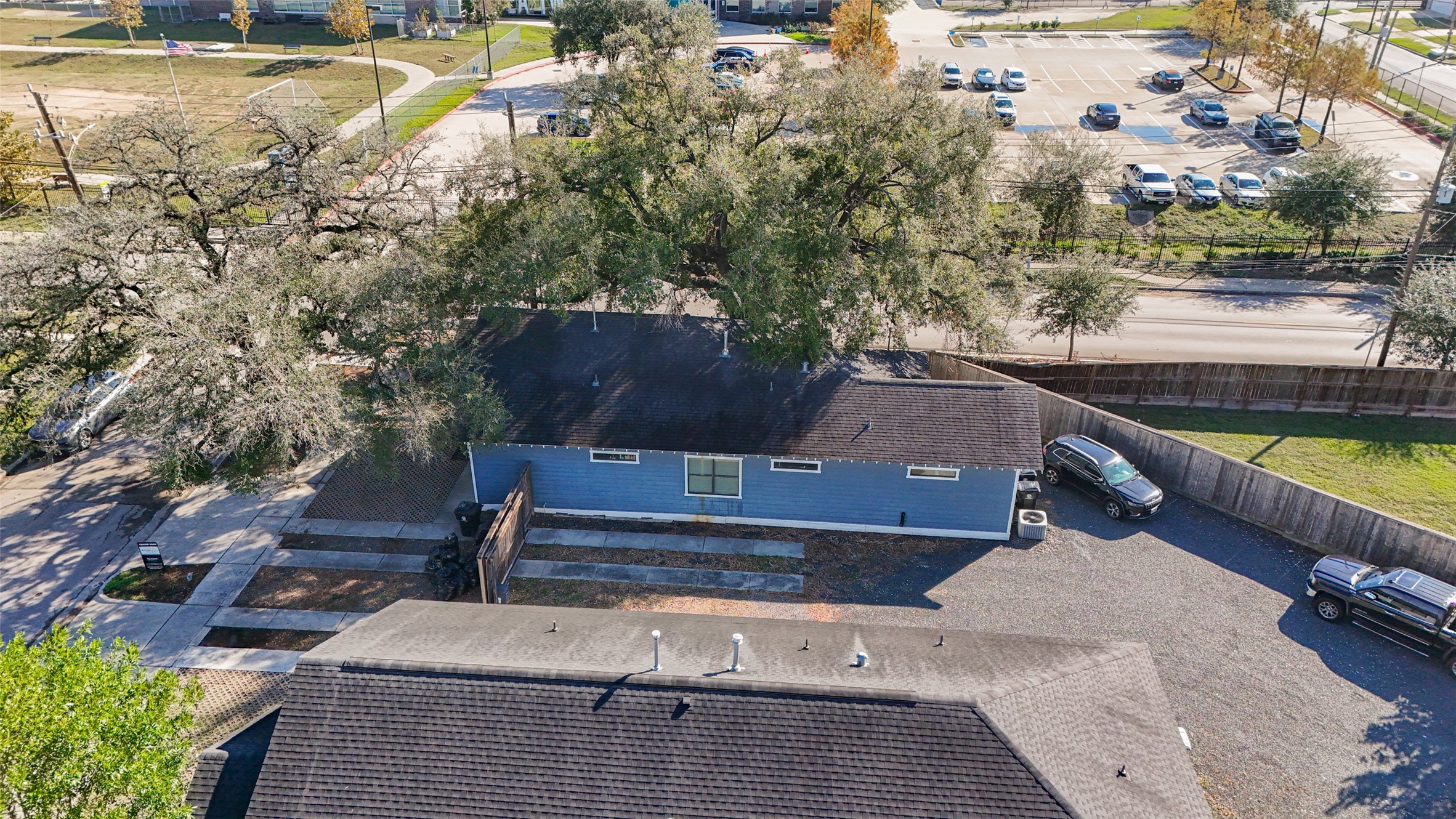 4734 Bell Street Houston, TX 77023 - Photo 39 of 42 a view of a swimming pool with a patio and a yard