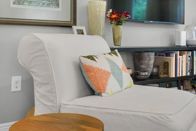 a kitchen with granite countertop a refrigerator oven a sink dishwasher and a stove with wooden floor