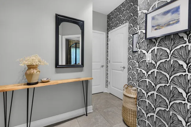 a bathroom with 2 sink and a mirror