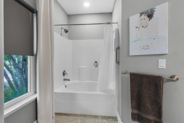 a garden with trees in the background