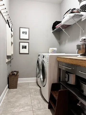 a view of a house with a backyard and sitting area
