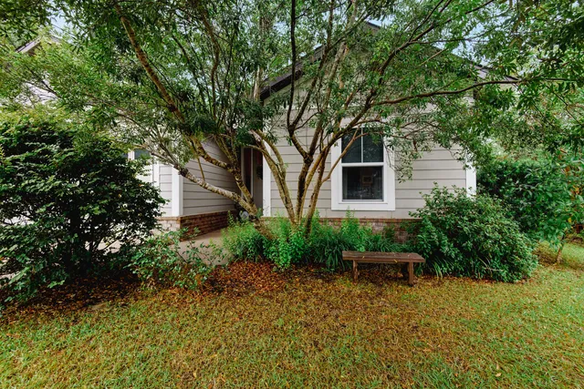 a backyard of a house with seating space