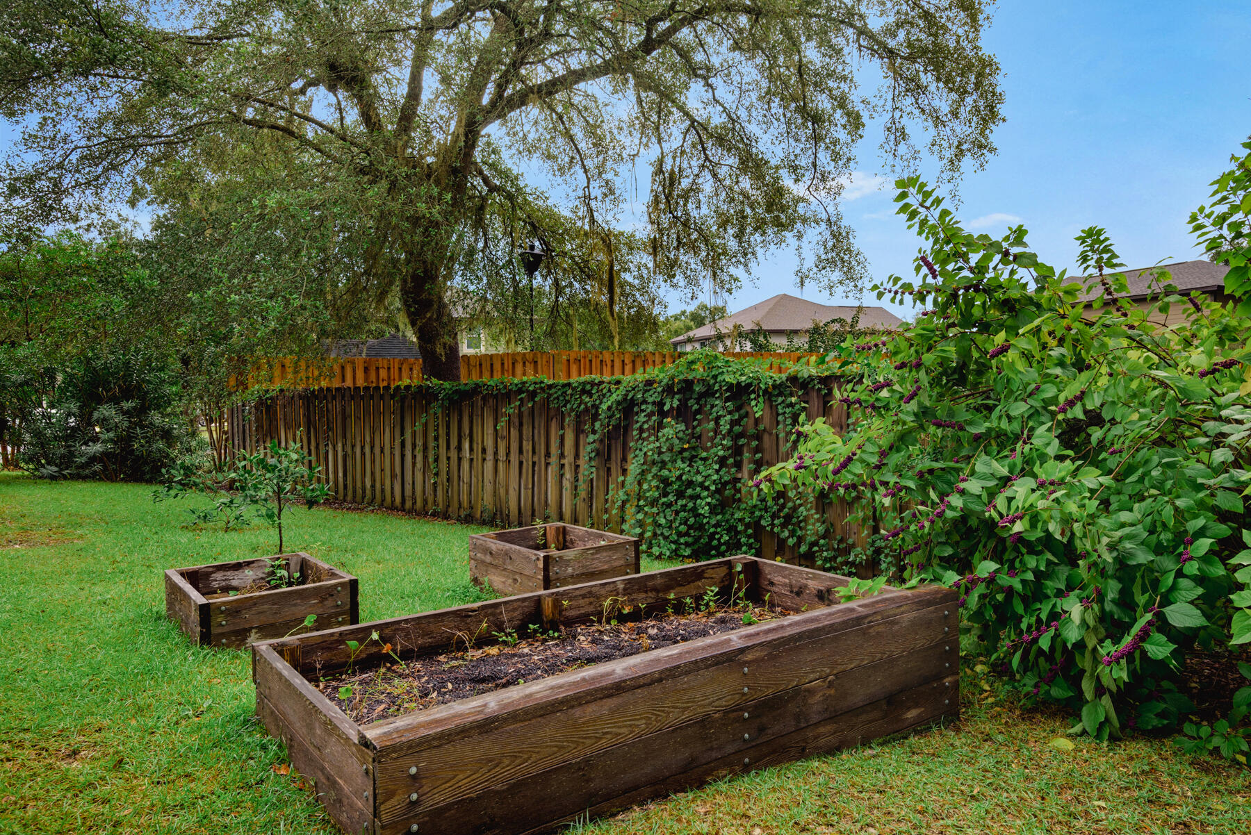 43 Hollyn Court Freeport, FL 32439 - Photo 33 of 35 a view of a backyard with sitting area