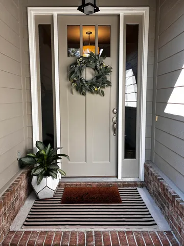 a view of a entryway door front of house