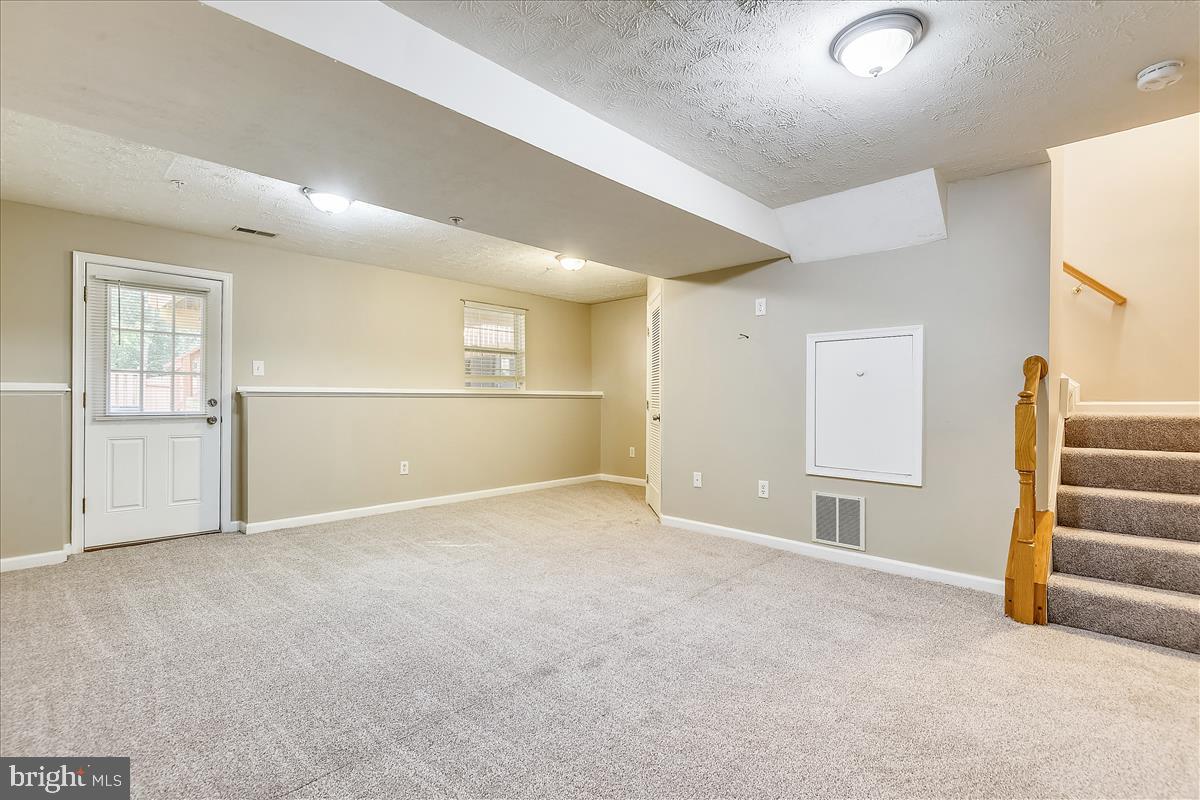 2554 Summers Ridge Drive Odenton, MD 21113 - Photo 15 of 20 Lower level family room with new carpet and paint