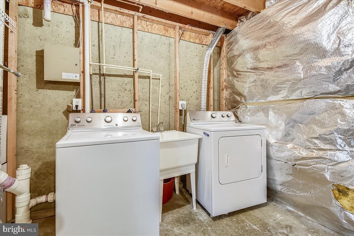 2554 Summers Ridge Drive Odenton, MD 21113 - Photo 17 of 20 Laundry room with storage
