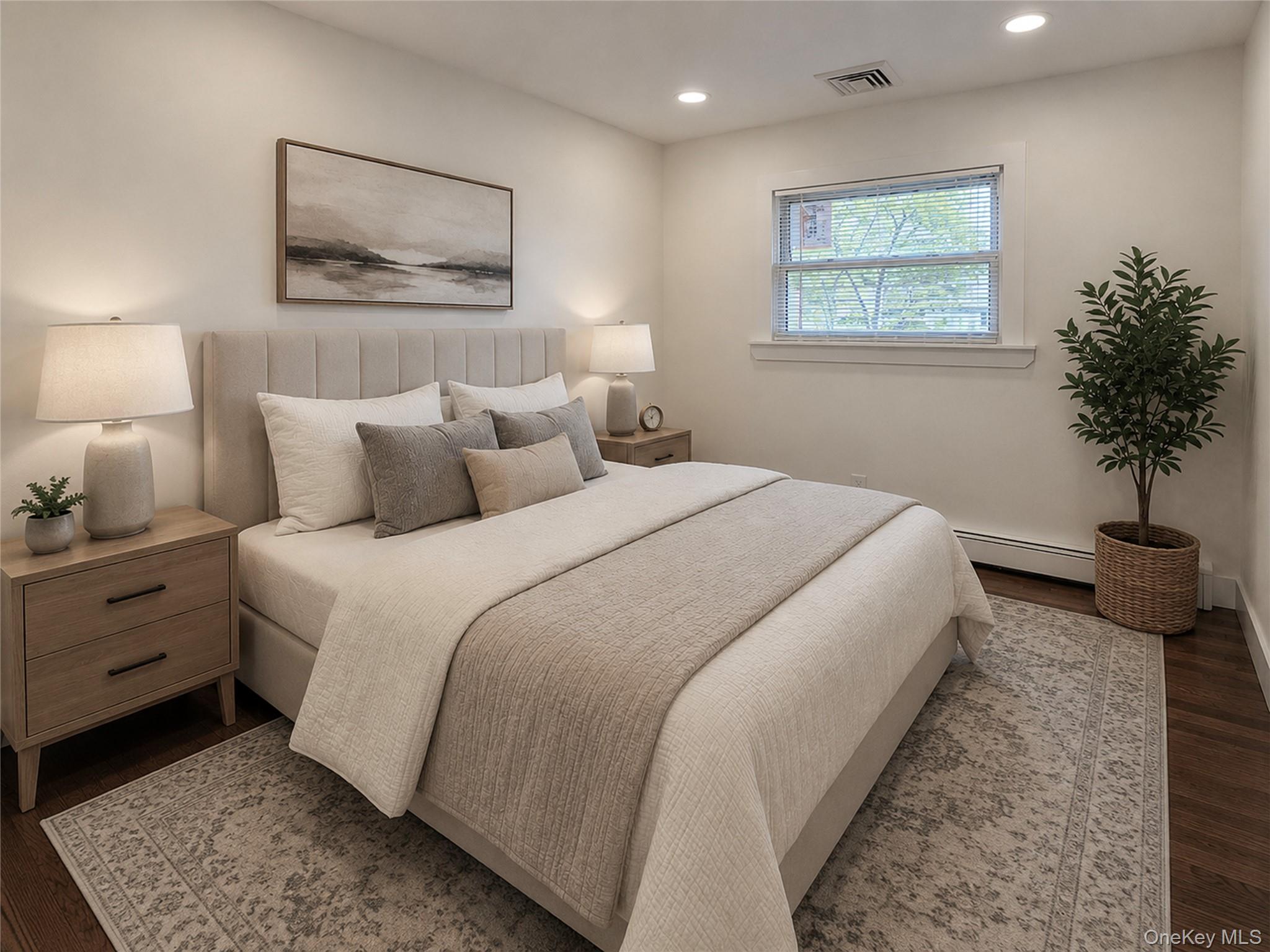 90 Blue Point Road Selden, NY 11784 - Photo 15 of 19 Bedroom featuring a window with blinds, recessed lighting, and wood-finish flooring
